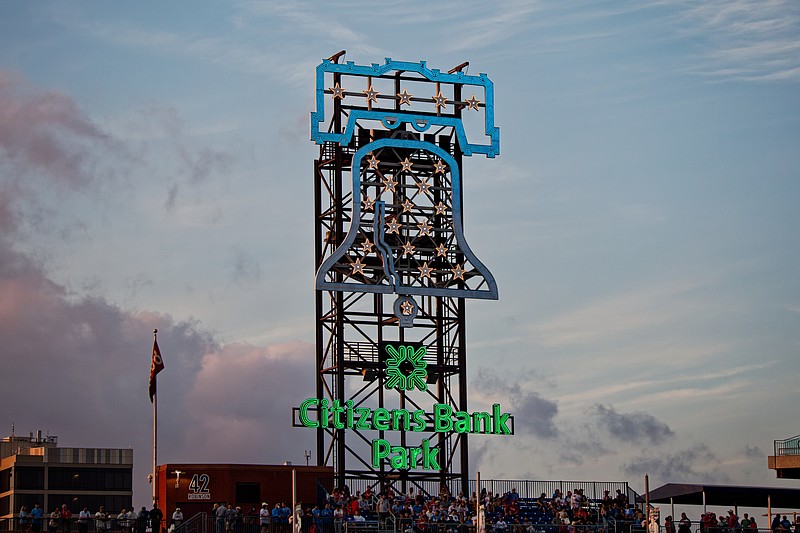 Aug 1, 2025; Philadelphia, Pennsylvania, USA; The sun sets behind the Liberty Bell at Citizens Bank Park. (Grace Del Pizzo/On Pattison)