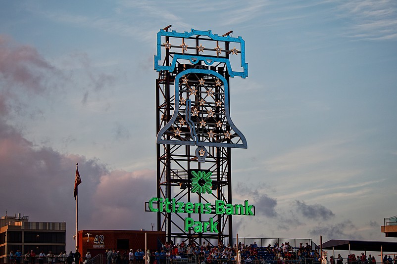 Aug 1, 2025; Philadelphia, Pennsylvania, USA; The sun sets behind the Liberty Bell at Citizens Bank Park. (Grace Del Pizzo/On Pattison)