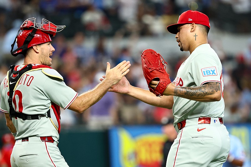 Aug 10, 2025; Arlington, Texas, USA;  Philadelphia Phillies relief pitcher Jhoan Duran (59) celebrates with Philadelphia Phillies catcher J.T. Realmuto (10) after the game against the Texas Rangers at Globe Life Field. Mandatory Credit: Kevin Jairaj-Imagn Images