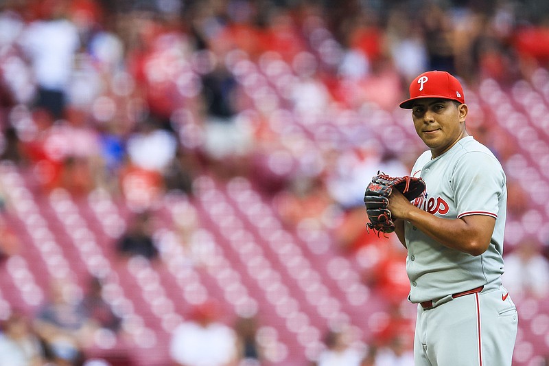 Aug 12, 2025; Cincinnati, Ohio, USA; Philadelphia Phillies starting pitcher Ranger Suarez (55) prepares to pitch in the first inning against the Cincinnati Reds at Great American Ball Park. Mandatory Credit: Katie Stratman-Imagn Images