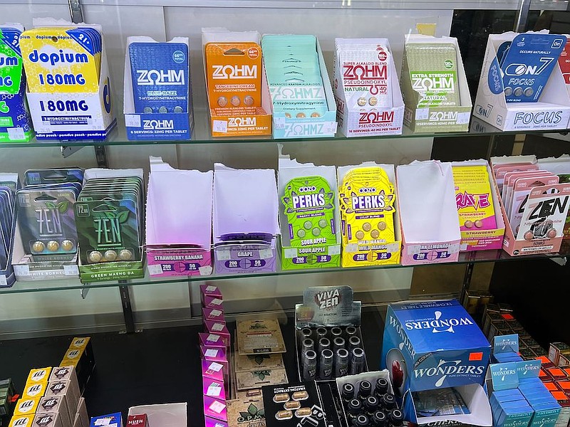A variety of kratom and 7-OH products — including capsules, cartridges and wellness shots — are on display at a smoke shop in Buffalo, N.Y. States have led the way in regulating kratom, and now federal officials want to ban 7-OH, a powerful compound found in some kratom products. (Credit: Amanda Hernández/Stateline)