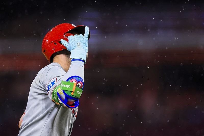 Aug 12, 2025; Cincinnati, Ohio, USA; Philadelphia Phillies first baseman Bryce Harper (3) reacts after hitting a solo home run in the ninth inning against the Cincinnati Reds at Great American Ball Park. Mandatory Credit: Katie Stratman-Imagn Images