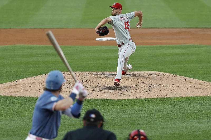Aug 15, 2025; Washington, District of Columbia, USA; Philadelphia Phillies starting pitcher Zack Wheeler (45) pitches against Washington Nationals outfielder Dylan Crews (3) during the second inning at Nationals Park. Mandatory Credit: Geoff Burke-Imagn Images