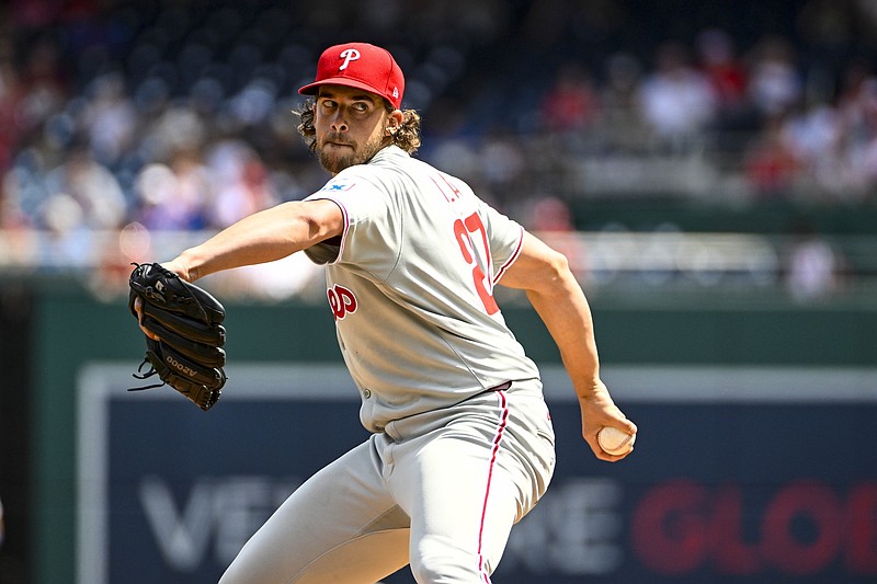 Aug 17, 2025; Washington, District of Columbia, USA; Philadelphia Phillies starting pitcher Aaron Nola (27) throws to the Washington Nationals during the first inning at Nationals Park. Mandatory Credit: Brad Mills-Imagn Images