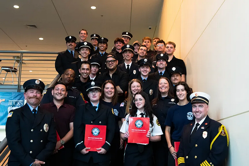 Firefighters who graduated from Bucks County Community College’s Lower Bucks Public Safety Training Center pose with their instructors at the Epstein Campus at Lower Bucks following an Aug. 7 ceremony. The 32 first responders, who hailed from 30 fire companies across Bucks, Montgomery and Delaware counties, completed basic fire academy/firefighter 1 certification. (Eric Parker/Bucks County Community College)
