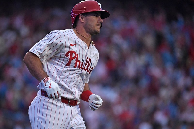 Aug 18, 2025; Philadelphia, Pennsylvania, USA; Philadelphia Phillies catcher J.T. Realmuto (10) celebrates his home run during the second inning against the Seattle Mariners at Citizens Bank Park. Mandatory Credit: Eric Hartline-Imagn Images