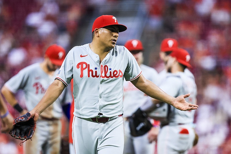 Aug 12, 2025; Cincinnati, Ohio, USA; Philadelphia Phillies starting pitcher Ranger Suarez (55) walks off the field during a pitching change in the sixth inning against the Cincinnati Reds at Great American Ball Park. Mandatory Credit: Katie Stratman-Imagn Images