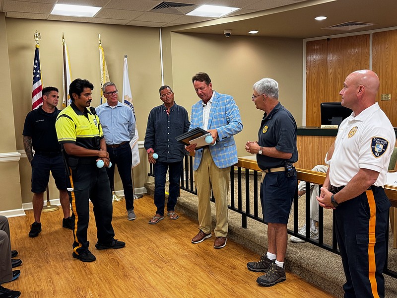 From left, Ocean City Firefighter Bryan McCloud, Longport Class 1 Police Officer Numa Rodriguez-Rojas, Commissioners Jim Ulmer and Dan Lawler, Mayor Patrick Armstrong, Longport Fire Chief Levon Clayton and Police Chief Frank Culmone.