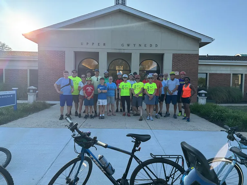 Participants in the Aug. 11 2025 ‘Critical Mass’ ride pose for a photo. (Courtesy Bill Jackson, Bike North Penn)
