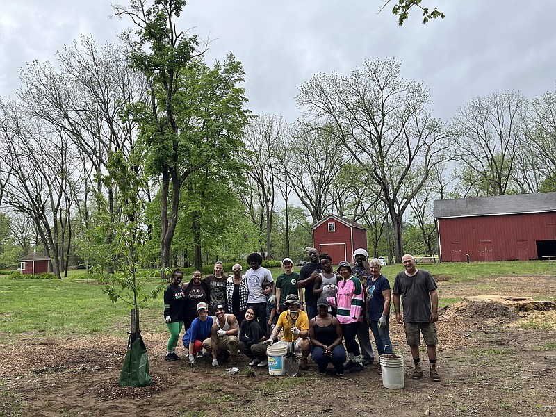 Tree replanting events like this one at Tinicum Park is just one way Bucks Beautiful fulfills its mission (Laurie To).