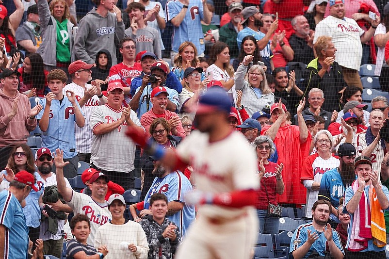 Aug 20, 2025; Philadelphia, Pennsylvania, USA; Fans cheer as Philadelphia Phillies outfielder Kyle Schwarber (12) runs the bases for a two RBI home run during the eighth inning against the Seattle Mariners at Citizens Bank Park. Mandatory Credit: Bill Streicher-Imagn Images