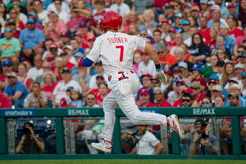 Aug 3, 2025; Philadelphia, Pennsylvania, USA; Philadelphia Phillies shortstop Trea Turner runs to first base against the Detroit Tigers at Citizens Bank Park. (Grace Del Pizzo/On Pattison)