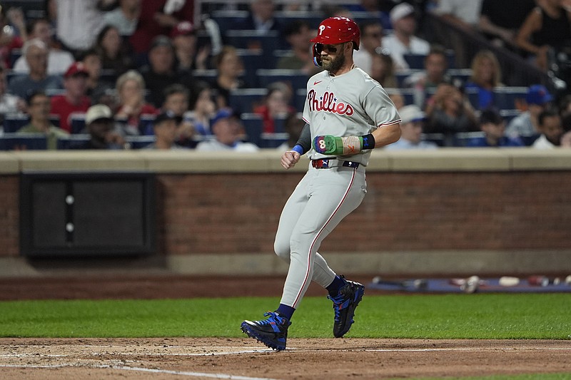 Aug 25, 2025; New York City, New York, USA; Philadelphia Phillies first baseman Bryce Harper (3) scores a run on Philadelphia Phillies third baseman Alec Bohm (28) (not pictured) RBI single against the New York Mets during the third inning at Citi Field. Mandatory Credit: Gregory Fisher-Imagn Images