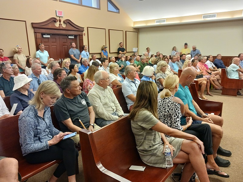 Sea Isle City homeowners pack the City Council chambers to voice their opposition to the pumping station's drainage design.