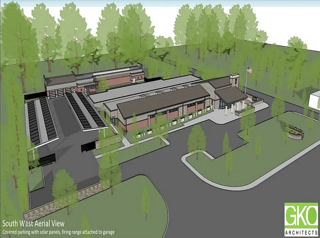 Rendering showing an aerial view of a planned new police station in Hatfield Township, with Cowpath Road at lower right, the new station building at right center, car ports covered with solar panels at left, and a firing range at rear. (Image courtesy of Hatfield Township)