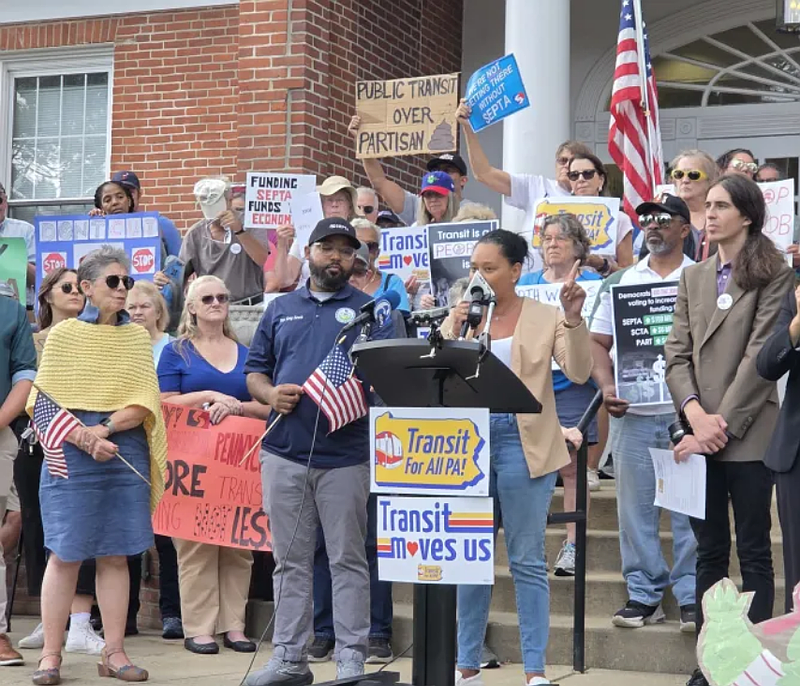 Montgomery County commissioner Jamila Winder, at podium, speaks at a rally in favor of SEPTA funding in North Wales on Tuesday, Aug. 26, 2025. (Dan Sokil – MediaNews Group)
