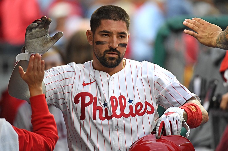 Aug 18, 2025; Philadelphia, Pennsylvania, USA; Philadelphia Phillies outfielder Nick Castellanos (8) celebrates in the dugout after scoring a run during the second inning against the Seattle Mariners at Citizens Bank Park. Mandatory Credit: Eric Hartline-Imagn Images