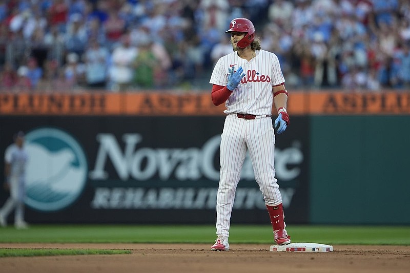 Aug 23, 2025; Philadelphia, Pennsylvania, USA; Philadelphia Phillies third baseman Alec Bohm (28) reacts to hitting a RBI double against the Washington Nationals during the fourth inning at Citizens Bank Park. Mandatory Credit: Gregory Fisher-Imagn Images