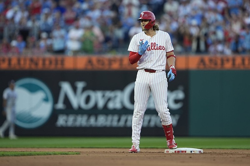 Aug 23, 2025; Philadelphia, Pennsylvania, USA; Philadelphia Phillies third baseman Alec Bohm (28) reacts to hitting a RBI double against the Washington Nationals during the fourth inning at Citizens Bank Park. Mandatory Credit: Gregory Fisher-Imagn Images