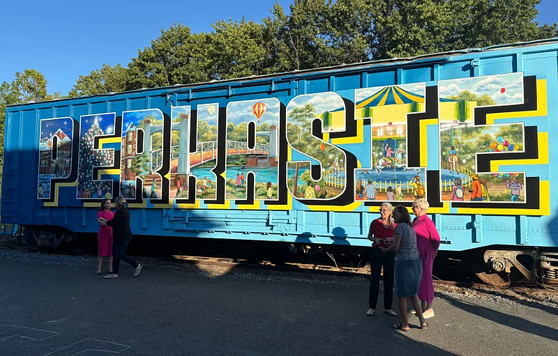 The mural covers the long-abandoned SEPTA freight car on the corner of North 8th Street and West Market Street in Perkasie.