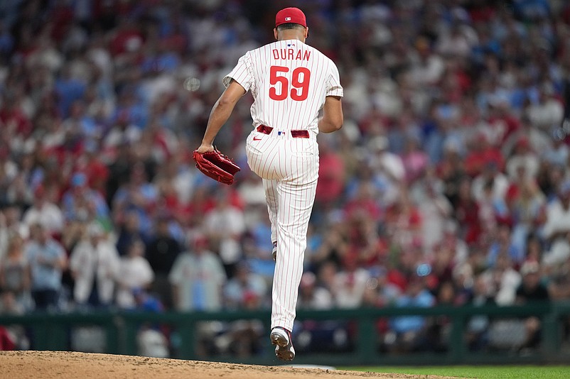 Aug 30, 2025; Philadelphia, Pennsylvania, USA; Philadelphia Phillies relief pitcher Jhoan Duran (59) reacts after striking out a batter against the Atlanta Braves in the ninth inning at Citizens Bank Park. Mandatory Credit: Kyle Ross-Imagn Images