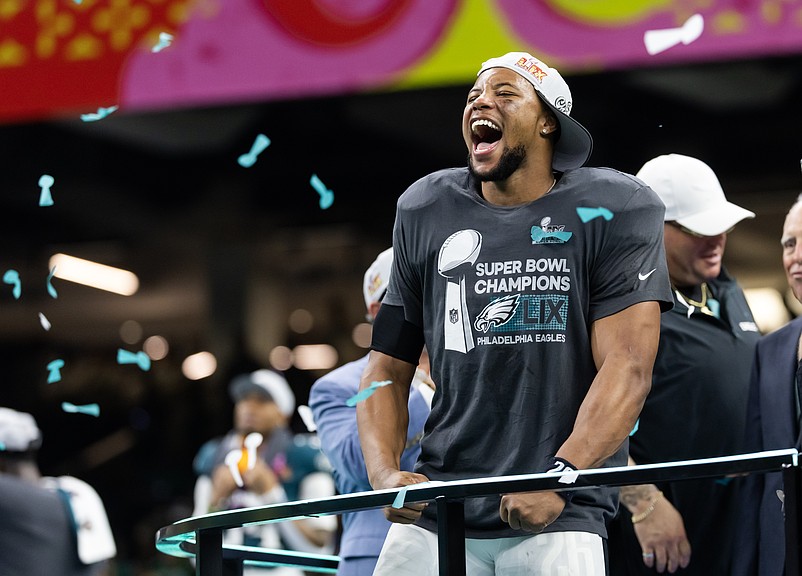 Feb 9, 2025; New Orleans, LA, USA; Philadelphia Eagles running back Saquon Barkley (26) celebrates after defeating the Kansas City Chiefs during Super Bowl LIX at Ceasars Superdome. Mandatory Credit: Mark J. Rebilas-Imagn Images