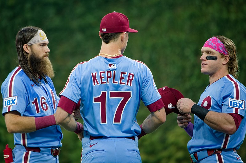 Aug 28, 2025; Philadelphia, Pennsylvania, USA; Philadelphia Phillies outfielders Brandon Marsh, Max Kepler and Harrison Bader talk during warmups at Citizens Bank Park. (Grace Del Pizzo/On Pattison)