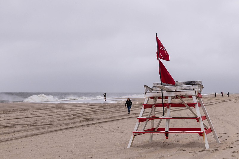 Red flags flown at a lifeguard stand in Cape May indicate that no swimming is allowed when the water is rough. (Photo courtesy of CapeMay.com)