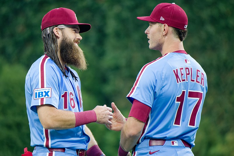 Aug 28, 2025; Philadelphia, Pennsylvania, USA; Philadelphia Phillies outfielders Brandon Marsh and Max Kepler share a handshake before a game against the Atlanta Braves at Citizens Bank Park. (Grace Del Pizzo/On Pattison)