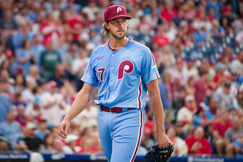 Aug 28, 2025; Philadelphia, Pennsylvania, USA; Philadelphia Phillies pitcher Aaron Nola heads to the dugout after an inning against the Atlanta Braves at Citizens Bank Park. (Grace Del Pizzo/On Pattison)