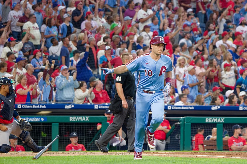 Aug 28, 2025; Philadelphia, Pennsylvania, USA; Philadelphia Phillies catcher J.T. Realmuto drops his bat after hitting a two-run home run against the Atlanta Braves at Citizens Bank Park. (Grace Del Pizzo/On Pattison)