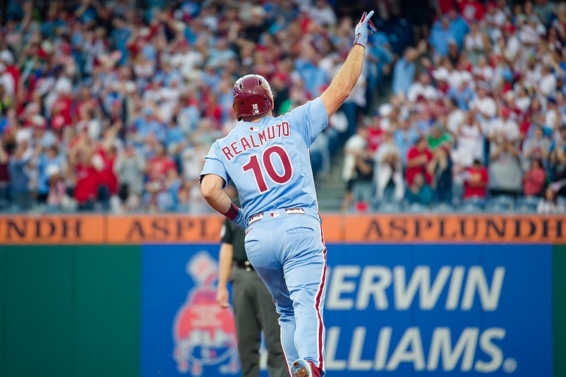 Aug 28, 2025; Philadelphia, Pennsylvania, USA; Philadelphia Phillies catcher J.T. Realmuto salutes the bullpen after hitting a two-run home run against the Atlanta Braves at Citizens Bank Park. (Grace Del Pizzo/On Pattison)