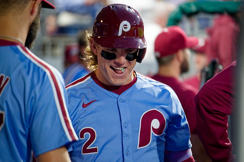 Aug 28, 2025; Philadelphia, Pennsylvania, USA; Philadelphia Phillies outfielder Harrison Bader smiles in the dugout after Bryce Harper's solo home run against the Atlanta Braves at Citizens Bank Park. (Grace Del Pizzo/On Pattison)