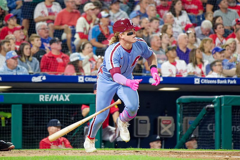Aug 28, 2025; Philadelphia, Pennsylvania, USA; Philadelphia Phillies outfielder Harrison Bader hits a triple against the Atlanta Braves at Citizens Bank Park. (Grace Del Pizzo/On Pattison)
