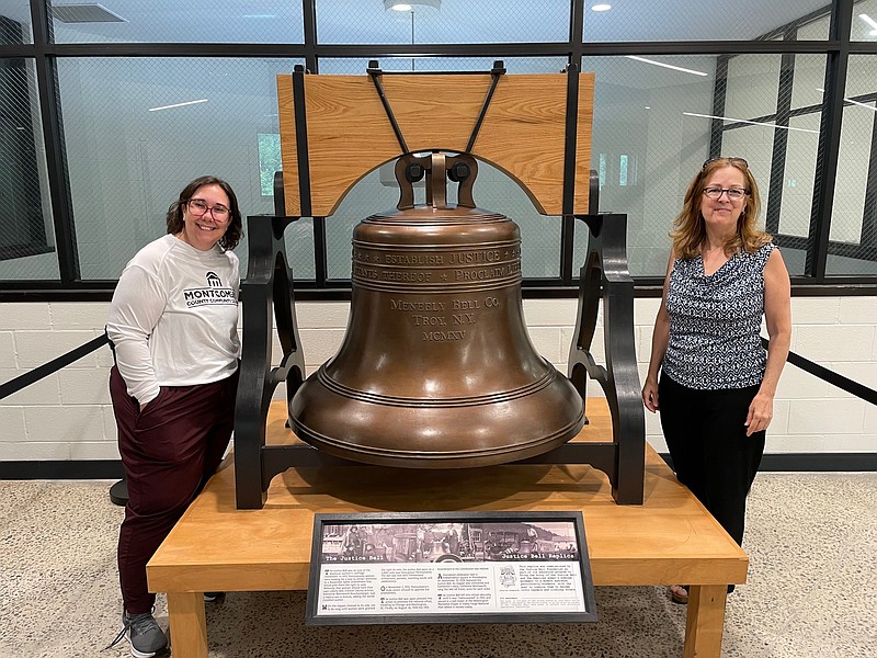 Nicole Maugle, MCCC Director of Libraries (left) coordinated the arrival and display of the bell with Amanda Owen (right), Executive Director of the Justice Bell Foundation. The Justice Bell Replica’s three-year residency at MCCC began in August 2024 at the Pottstown Campus and continues on the Blue Bell Campus until August 2027. Photo by Diane VanDyke