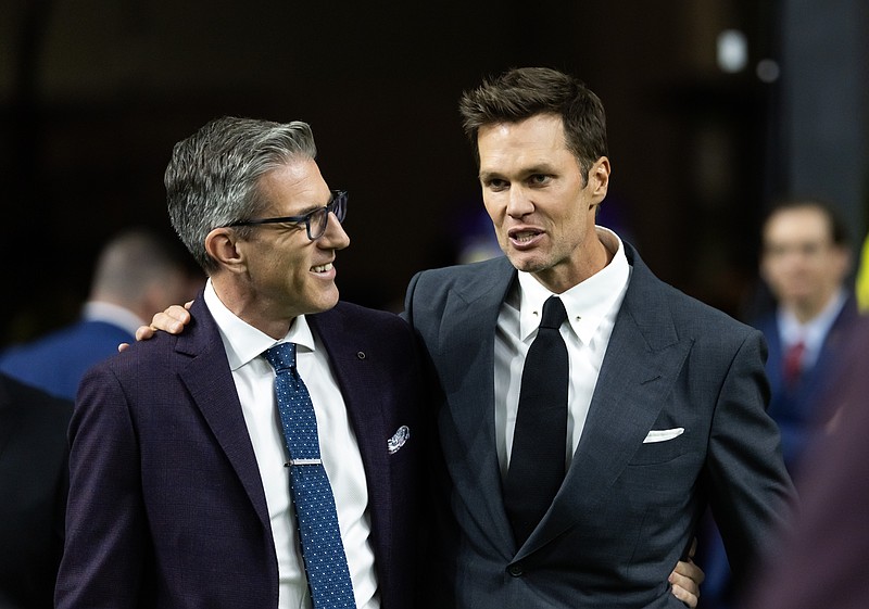 Feb 9, 2025; New Orleans, LA, USA; Fox Sports announcer Kevin Burkhardt (left) with Tom Brady on the field before Super Bowl LIX between the Philadelphia Eagles and the Kansas City Chiefs at Ceasars Superdome. Mandatory Credit: Mark J. Rebilas-Imagn Images