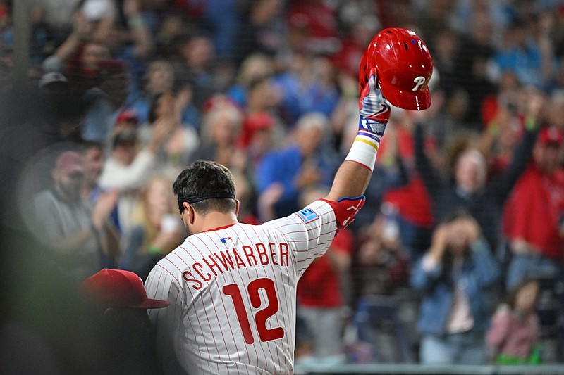 Sep 9, 2025; Philadelphia, Pennsylvania, USA; Philadelphia Phillies outfielder Kyle Schwarber (12) acknowledges the crowd after hitting his 50th home run of the season during the seventh inning against the New York Mets at Citizens Bank Park. Mandatory Credit: Eric Hartline-Imagn Images