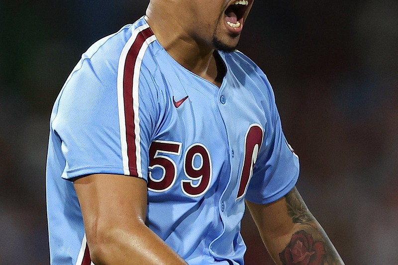 Sep 11, 2025; Philadelphia, Pennsylvania, USA; Philadelphia Phillies pitcher Jhoan Duran (59) reacts after a strike out to end the game with a win against the New York Mets at Citizens Bank Park. Mandatory Credit: Bill Streicher-Imagn Images