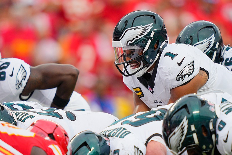 Sep 14, 2025; Kansas City, Missouri, USA; Philadelphia Eagles quarterback Jalen Hurts (1) calls a play at the line of scrimmage against the Kansas City Chiefs during the fourth quarter of the game at GEHA Field at Arrowhead Stadium. Mandatory Credit: Jay Biggerstaff-Imagn Images