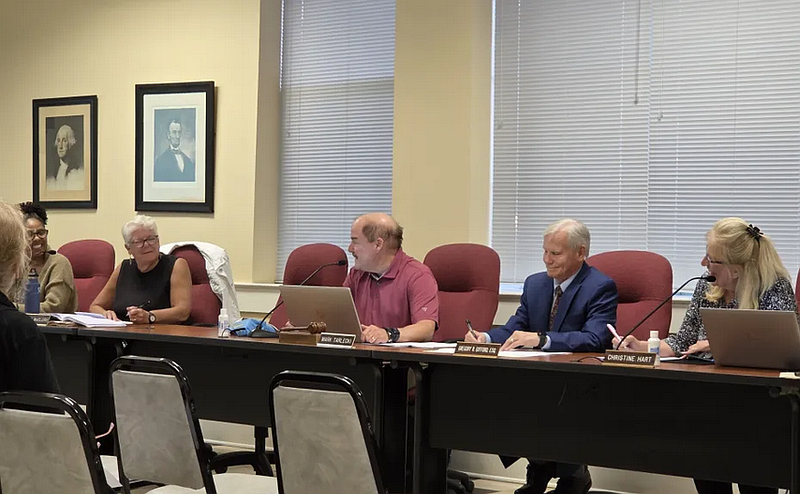North Wales council members, from left, Anji Fazio, Wendy McClure and Mark Tarlecki share a smile as McClure was nominated for the position of council vice president and borough solicitor Greg Gifford and borough Manager Christine Hart look on, during the council meeting on Tuesday, Sept. 9 2025.