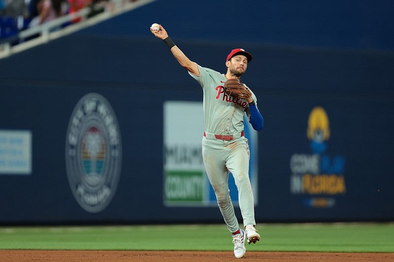 Sep 5, 2025; Miami, Florida, USA; Philadelphia Phillies shortstop Trea Turner (7) throws to first base to retire Miami Marlins second baseman Javier Sanoja (not pictured) during the fifth inning at loanDepot Park. Mandatory Credit: Sam Navarro-Imagn Images