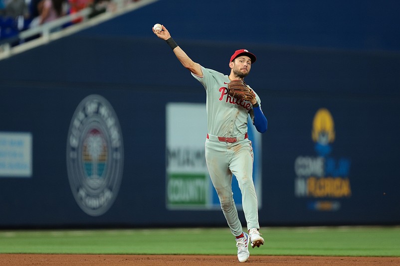 Sep 5, 2025; Miami, Florida, USA; Philadelphia Phillies shortstop Trea Turner (7) throws to first base to retire Miami Marlins second baseman Javier Sanoja (not pictured) during the fifth inning at loanDepot Park. Mandatory Credit: Sam Navarro-Imagn Images