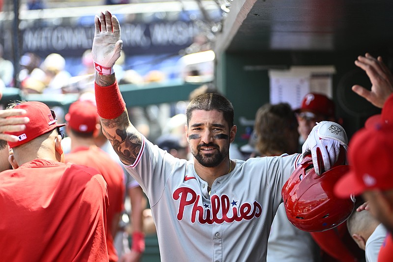 Aug 17, 2025; Washington, District of Columbia, USA; Philadelphia Phillies right fielder Nick Castellanos (8) is congratulated by teammates after hitting a home run against the Washington Nationals during the sixth inning at Nationals Park. Mandatory Credit: Brad Mills-Imagn Images