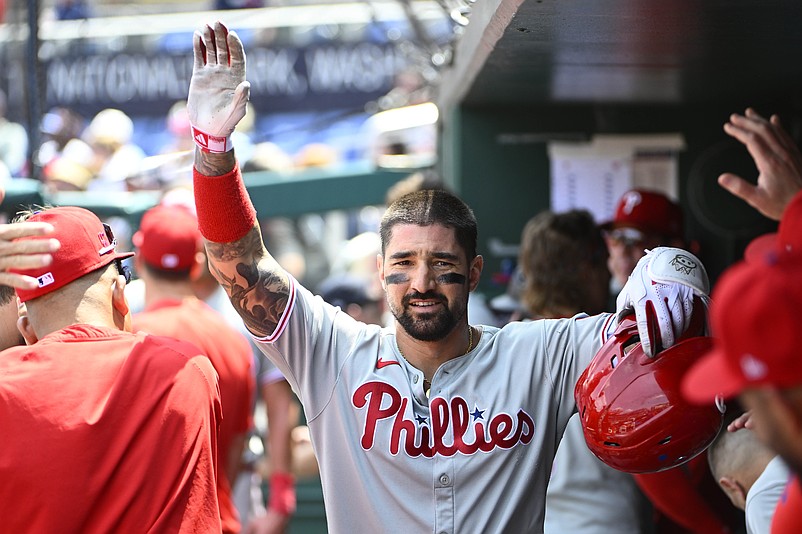 Aug 17, 2025; Washington, District of Columbia, USA; Philadelphia Phillies right fielder Nick Castellanos (8) is congratulated by teammates after hitting a home run against the Washington Nationals during the sixth inning at Nationals Park. Mandatory Credit: Brad Mills-Imagn Images