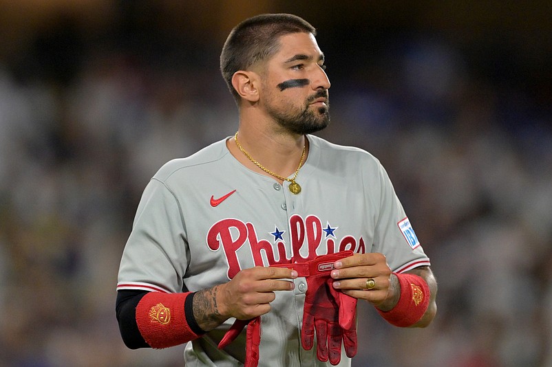 Sep 17, 2025; Los Angeles, California, USA;   Philadelphia Phillies right fielder Nick Castellanos (8) returns to the dugout after an out against the Los Angeles Dodgers at Dodger Stadium. Mandatory Credit: Jayne Kamin-Oncea-Imagn Images
