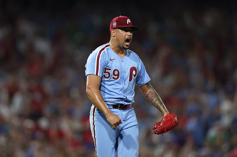 Sep 11, 2025; Philadelphia, Pennsylvania, USA; Philadelphia Phillies pitcher Jhoan Duran (59) reacts after a strike out to end the game with a win against the New York Mets at Citizens Bank Park. Mandatory Credit: Bill Streicher-Imagn Images