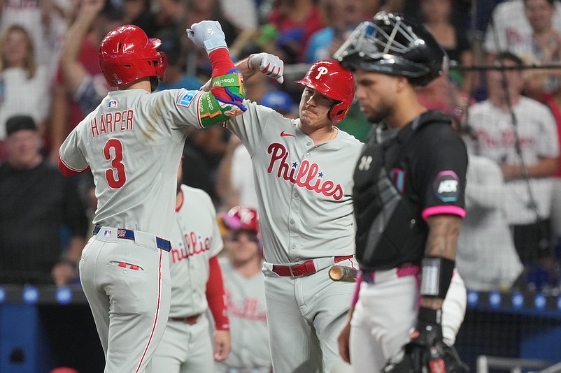 Sep 6, 2025; Miami, Florida, USA;  Philadelphia Phillies first baseman Bryce Harper (3) is congratulated by catcher J.T. Realmuto (10) after hitting a two-run home run in the first inning at loanDepot Park. Mandatory Credit: Jim Rassol-Imagn Images