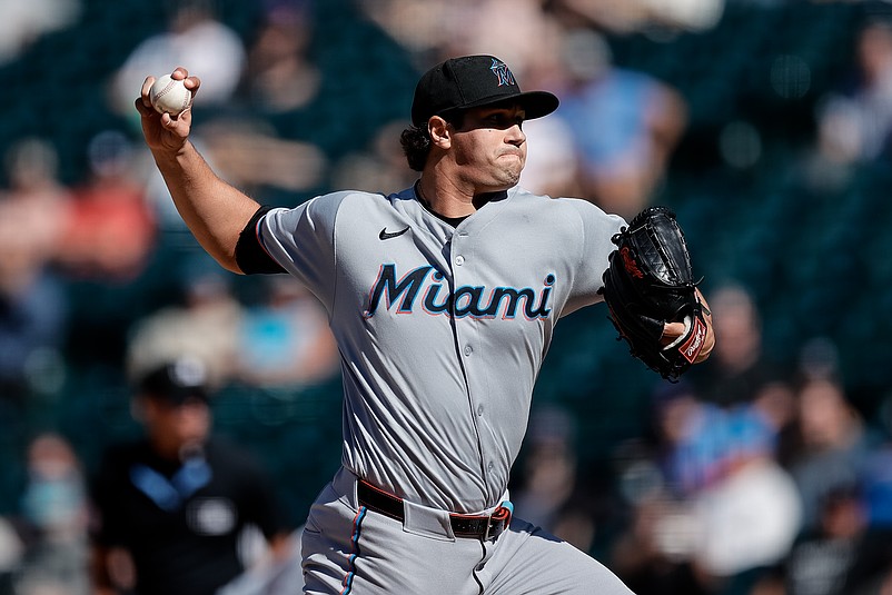 Sep 18, 2025; Denver, Colorado, USA; Miami Marlins relief pitcher Tyler Phillips (30) pitches in the seventh inning against the Colorado Rockies at Coors Field. Mandatory Credit: Isaiah J. Downing-Imagn Images