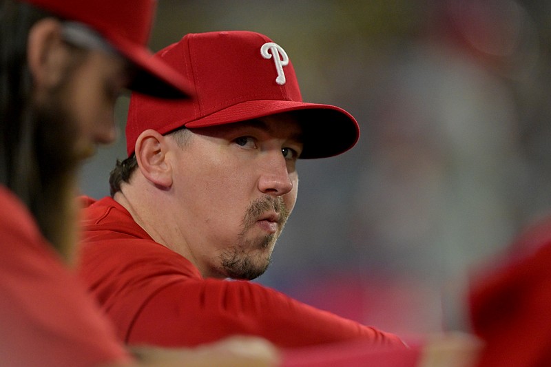 Sep 17, 2025; Los Angeles, California, USA;  Philadelphia Phillies starting pitcher Walker Buehler (31) looks on from the dugout during the game against the Los Angeles Dodgers at Dodger Stadium. Mandatory Credit: Jayne Kamin-Oncea-Imagn Images