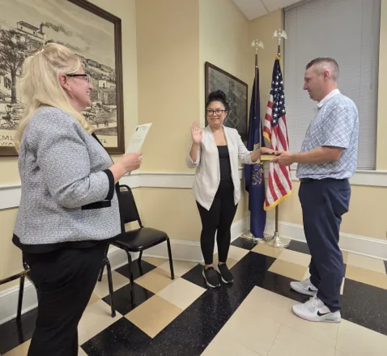 Star Little, center, receives her oath to join North Wales borough council from borough Manager Christine Hart, left, during the council meeting on Tuesday, Sept. 23, 2025.